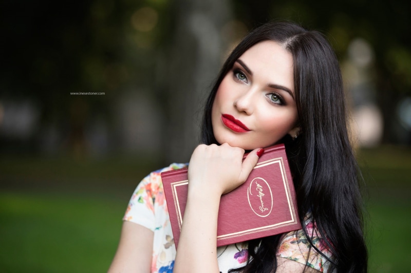 beauty, young adult, contemplation, books, portrait, hair, happiness, colorful, outdoors, blue eyes, front view, beautiful people, focus on foreground