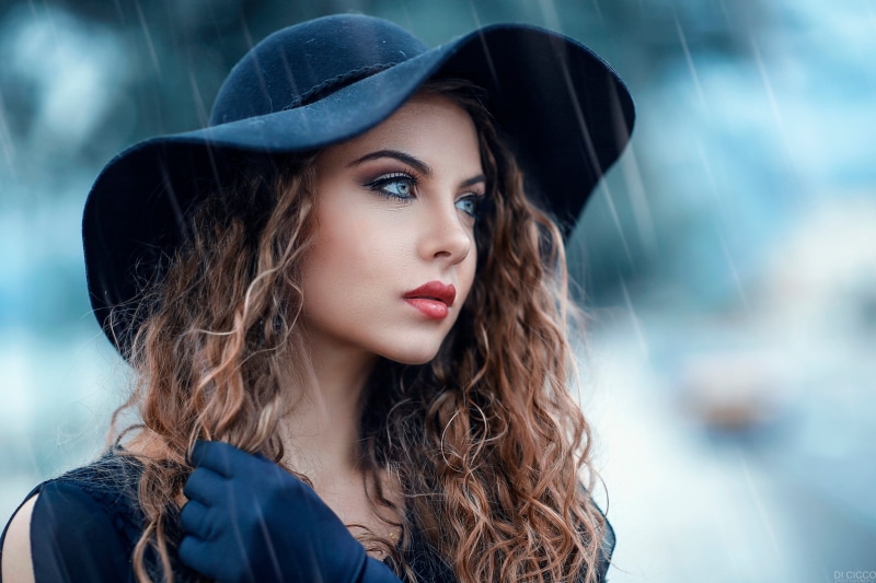face, looking away, portrait, millinery, curly hair, women, 1080P, hat, gloves, blue eyes, depth of field, red lipstick, rain, black clothing, brunette