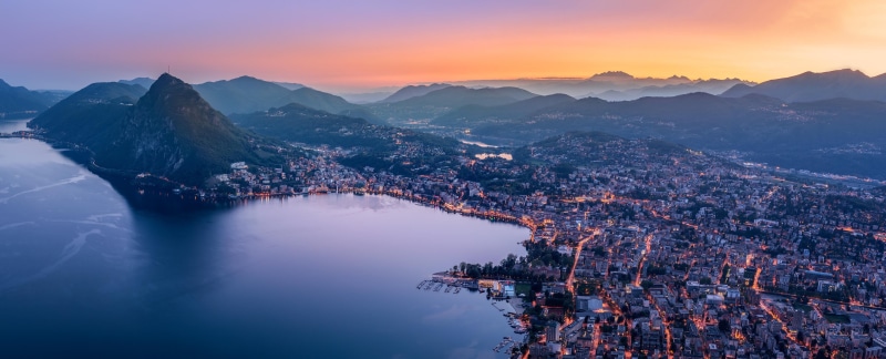 city, mountain peak, mountain range, outdoors, travel destinations, cityscape, aerial, lights, night, sky, view, tranquility, nature, architecture, dusk