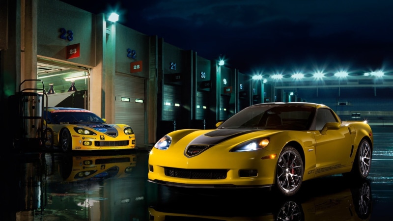 parking garage, built structure, sports car, modern, yellow, transportation, black, 1080P, outdoors, night, architecture, land vehicle, motor vehicle
