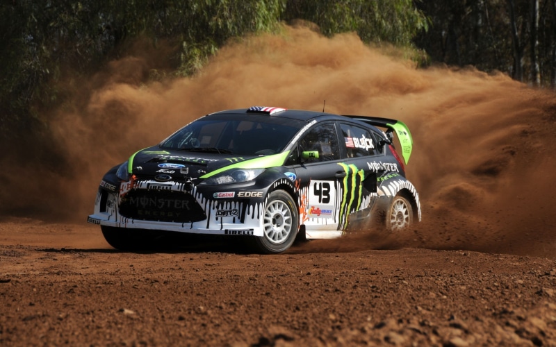 car, motor vehicle, outdoors, tree, motion, tire, mode of transportation, Ken Block, Ford Fiesta, land, land vehicle, speed, luxury, dust, sports car, dirt road