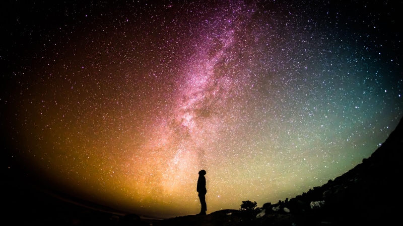 tranquility, starry night, 4K, night sky, scenics - nature, real people, star, purple, arms raised, low angle view, tranquil scene, astronomy, stars, sky