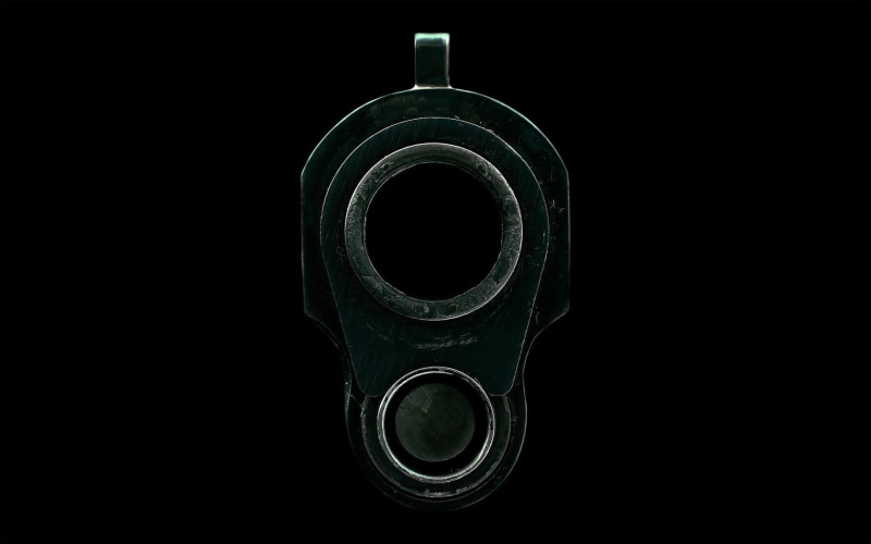 simple background, black, technology, circle, studio shot, pistol, no people, communication, black background, safety, geometric shape, protection, still life