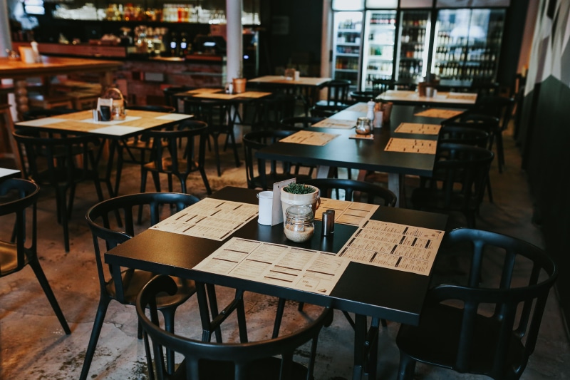 pub, cafe culture, glasses, chair, wood - material, alcohol, absence, food and drink industry, sidewalk cafe, cafeteria, day, table, drink, coffee, glass
