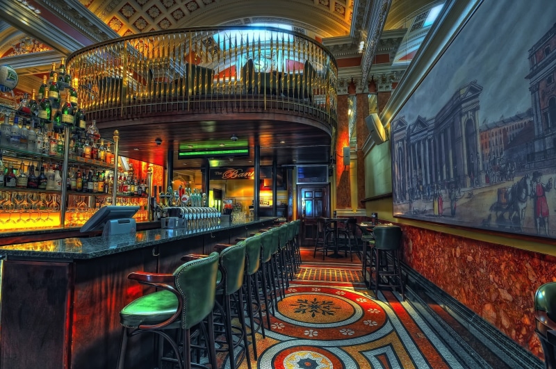 indoors, lighting equipment, seat, rail transportation, 1080P, spirituality, building, travel, illuminated, pub, bar, belief, religion, inside
