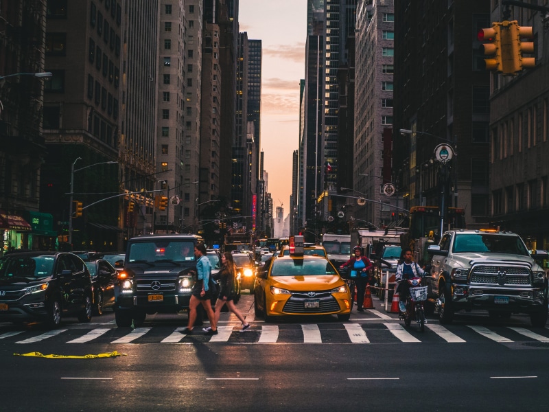 vehicles, times, city, group of people, land vehicle, mode of transportation, architecture, walking, sun setting, 4K, built structure, road, crowd, street