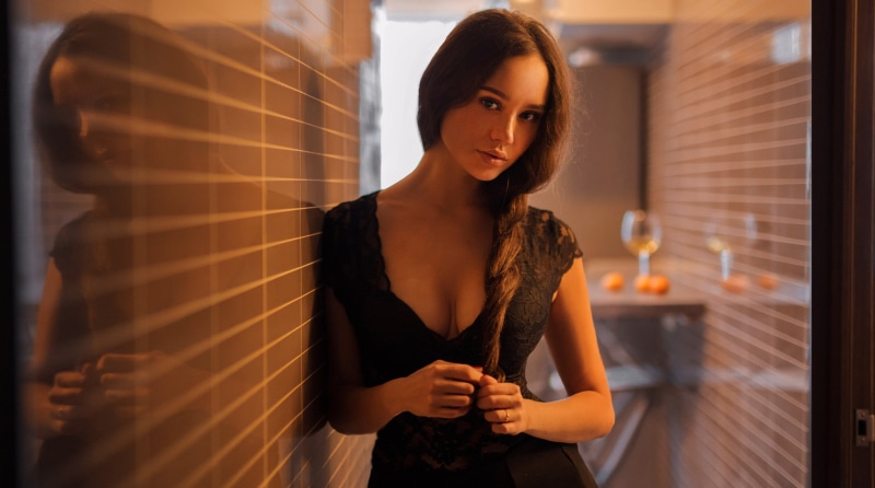 cleavage, black dress, beauty, braids, looking at viewer, waist up, hair, looking at camera, young adult, brown eyes, one person, standing, neck, beautiful woman