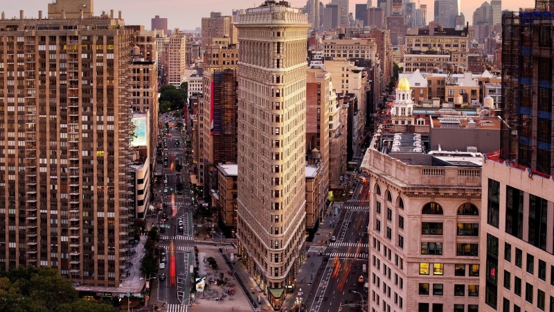 crowd, city life, new york city, transportation, flatiron building, urban skyline, tall - high, landmark, high angle view, street, financial district, apartment
