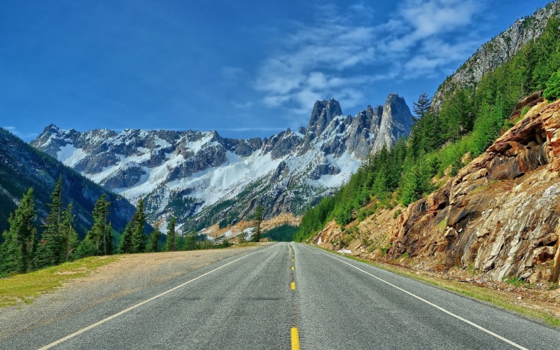 tranquil scene, beauty in nature, the way forward, sign, nature, double yellow line, road, dividing line, transportation, diminishing perspective, road marking