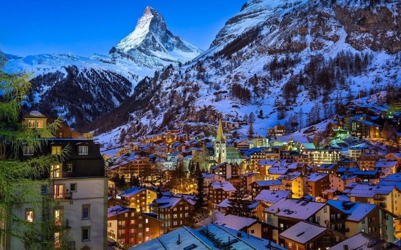 Switzerland, winter, brown, trees, building, cold temperature, lights, white, built structure, townscape, town, houses, snowcapped mountain, no people