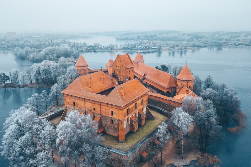 no people, 1080P, Trakai Island Castle, nature, building exterior, city, high angle view, water, fog, winter, architecture, rooftops, outdoors, tree, travel destinations