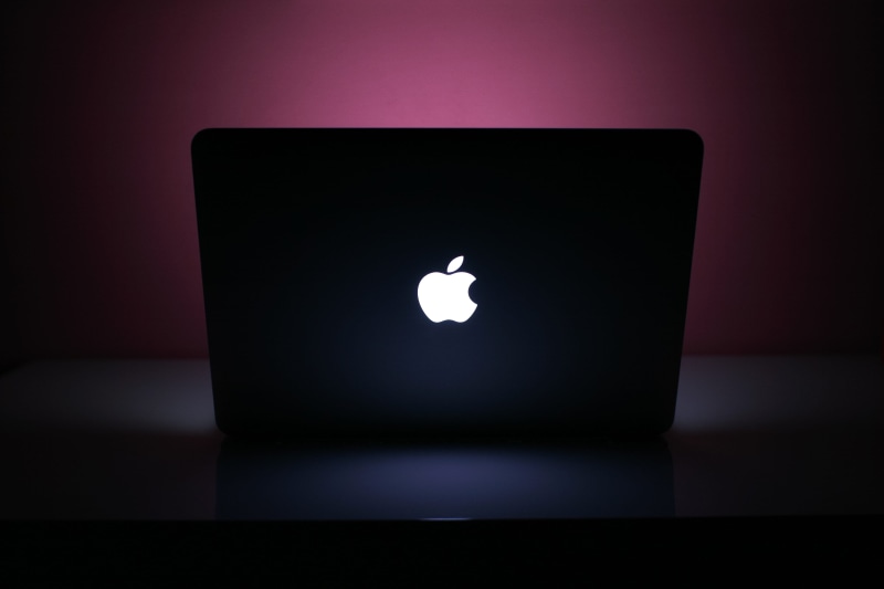 Pink, internet, simplicity, black background, computer, reflection, working, illuminated, communication, dark, no people, glowing, light - natural phenomenon