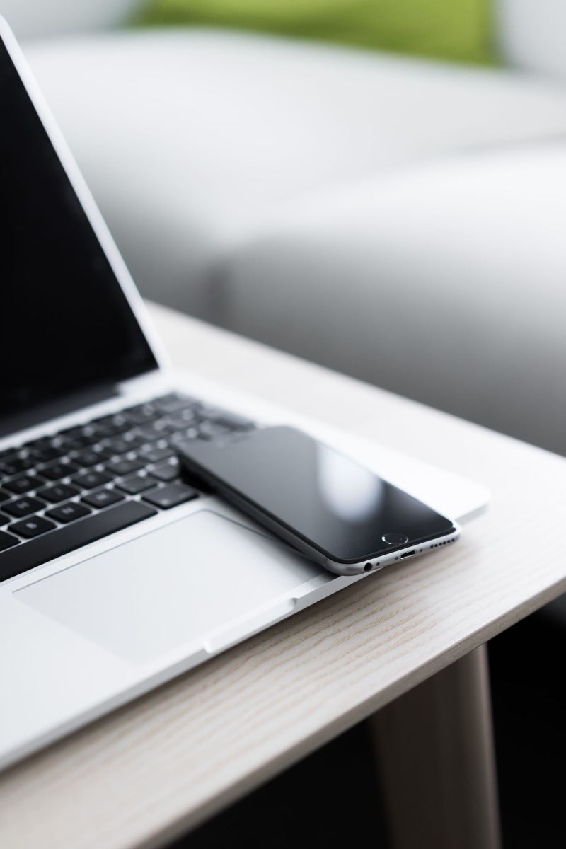 technology, modern, no people, top, indoors, office, close-up, mobile, sleek, iphone, tech, macbook, table, 4K, internet, smartphone, working, selective focus