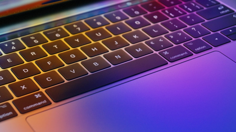 pro, hardware, social networking, modem, indoors, mac os, data, communication, laptop, keyboard, text, security, studio shot, computer equipment, gold