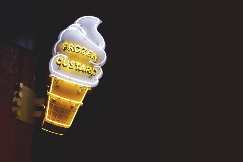 sign, wealth, light, man made, custard, copy space, indoors, gold colored, insubstantial, neon light, cold, container, cut out, yellow, black background