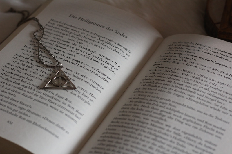 page, spirituality, harry, high angle view, belief, event, close-up, knowledge, celebration, western script, read, positive emotion, book, hobby, open