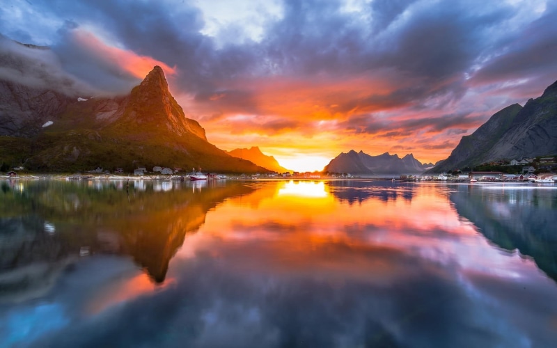 orange color, tranquil scene, sea, lake, sky, summer, mountains, tranquility, waterfront, scenics - nature, village, island, nature, mountain range, beauty in nature