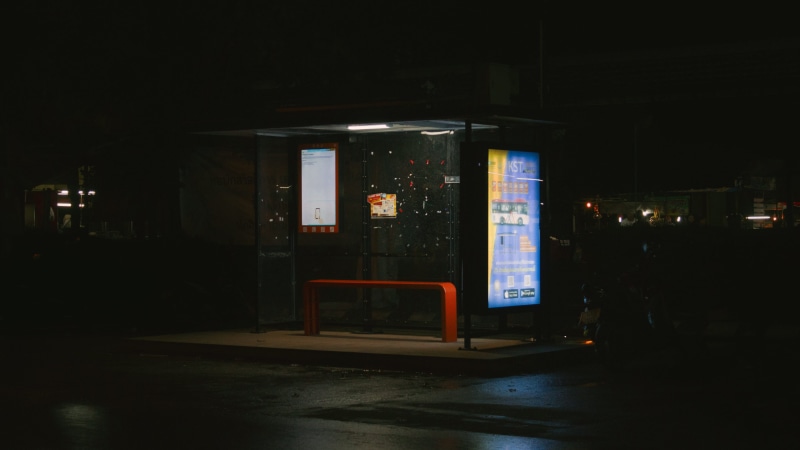 communication, sidewalk, text, built structure, transportation, 4K, illuminated, architecture, bus stop, night, dark, no people, rain, empty, wet, light