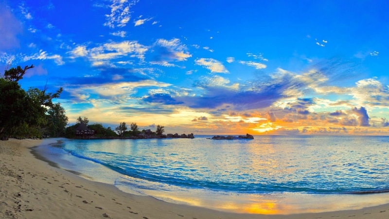 idyllic, beach, horizon, clouds, turquoise, scene, 1080P, wave, no people, vacation, cloud - sky, tranquil, resort, sunset, coast, tree, tourism, scenics - nature