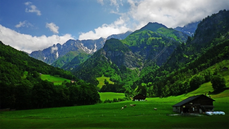 mountain, sky, mountain range, environment, non-urban scene, landscape, idyllic, plant, wooden, outdoors, tree, mountains, no people, tranquil scene, spring