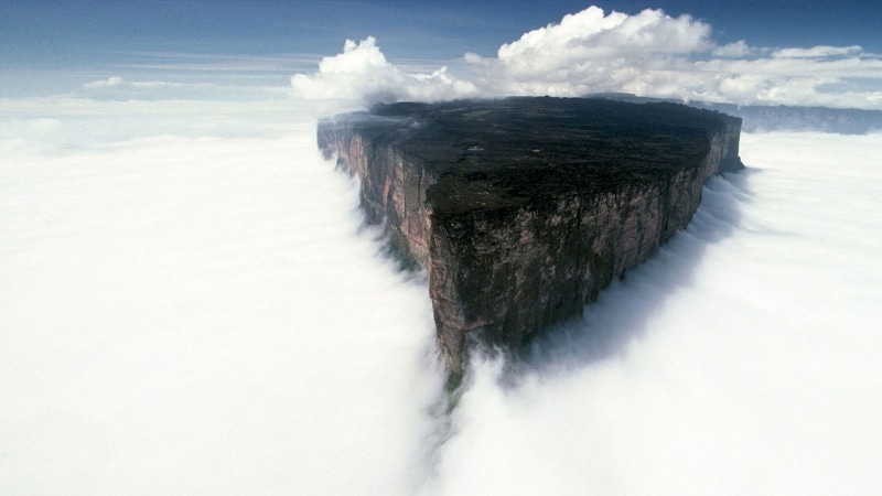 beauty in nature, clouds, top, cloud - sky, sea, sky, tranquil scene, day, environment, power in nature, water, volcanic crater, tranquility, scenics - nature