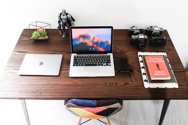 high angle view, computer, table, connection, furniture, portable information device, still life, camera - photographic equipment, communication, business
