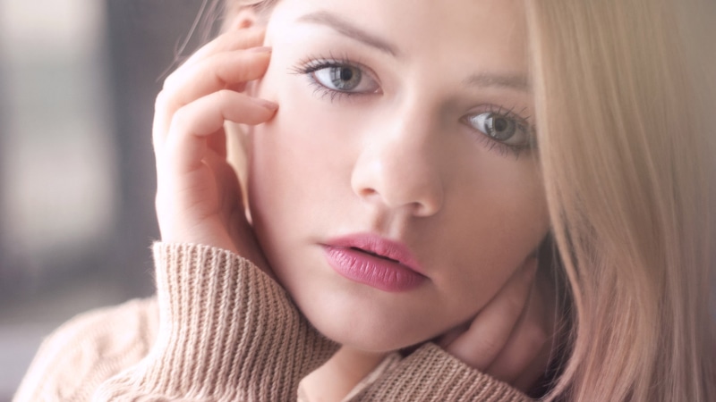 human face, hairstyle, adult, blonde, beautiful woman, closeup, model, hands, depression - sadness, blue eyes, head in hands, 2K, headshot, hand, hand on face