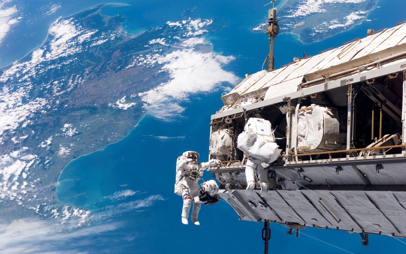 vertebrate, blue, sunlight, men, sky, building, outdoors, day, real people, New Zealand, low angle view, NASA, people, nature, two, water, astronaut, architecture