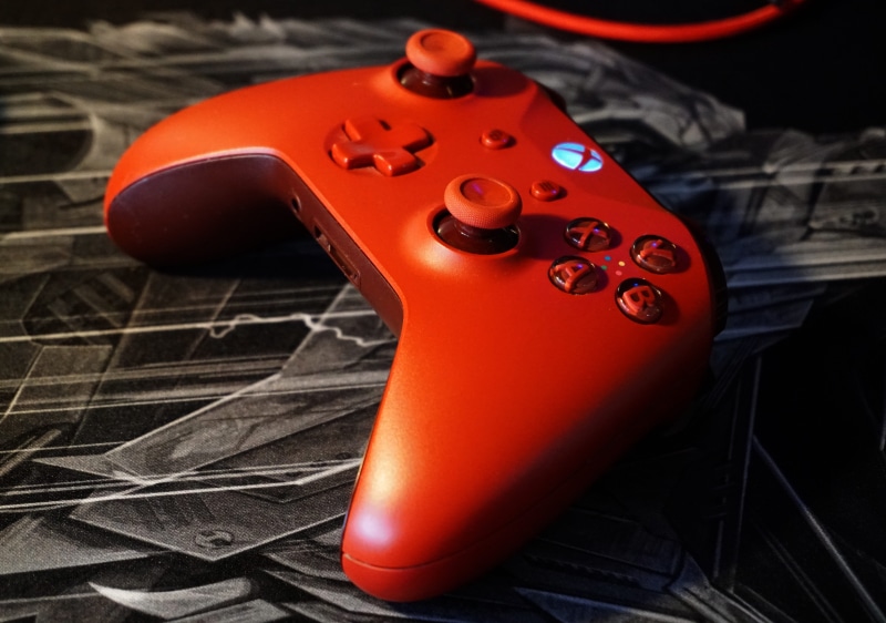 play, gamepad, gamer, electric guitar, gaming, controller, control, wood - material, console, fun, red, x-box, focus on foreground, still life, guitar