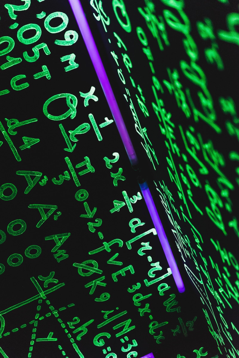 illuminated, physic, close-up, green color, light, mathematics, electricity, study, data, number, background, school, indoors, text, low angle view, backgrounds