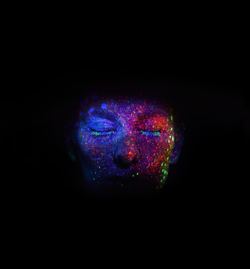 young adult, glitters, eyes closed, paint splatter, closed eye, art, black, creativity, s, studio shot, face paint, indoors, multi colored, women, glowing