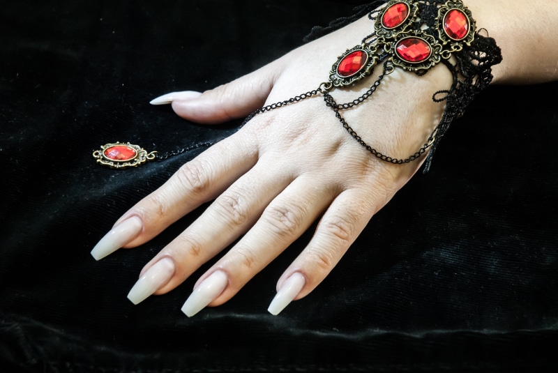 luxury, hand, nail polish, jewelry, nail art, body part, studio shot, art, human limb, black color, wearing, nail, black background, one person, fashion