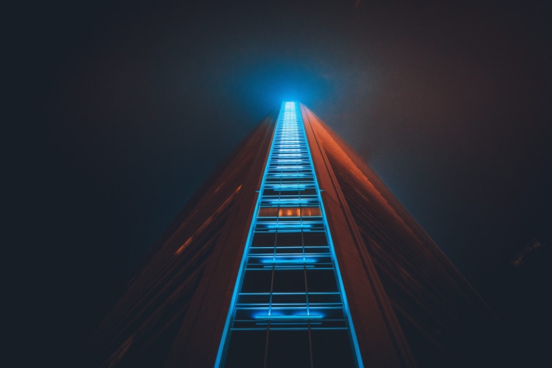 ladder, low, lighting equipment, worm, urban, light, triangle shape, futuristic, led, building exterior, night, outdoors, rise, sky, tower, 5K, low angle view