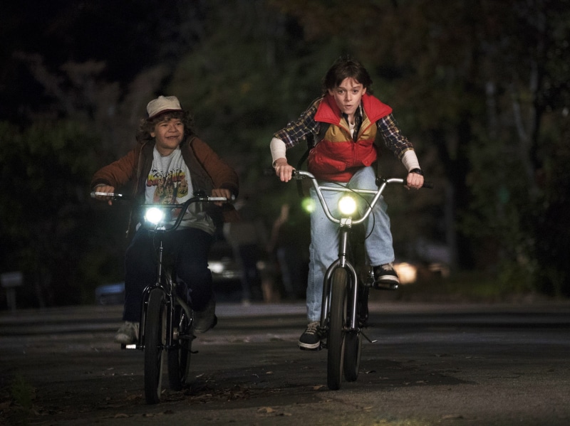 two people, mature men, figurine, sport, full length, men, dark, togetherness, front view, Netflix, activity, red, suit, ride, people, mode of transportation