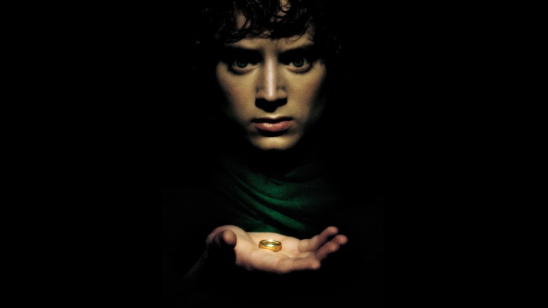 studio shot, front view, black, portrait, contemplation, mystery, men, dark, young adult, one person, hairstyle, adult, indoors, Frodo Baggins, The Lord of the Rings: The Fellowship of the Ring