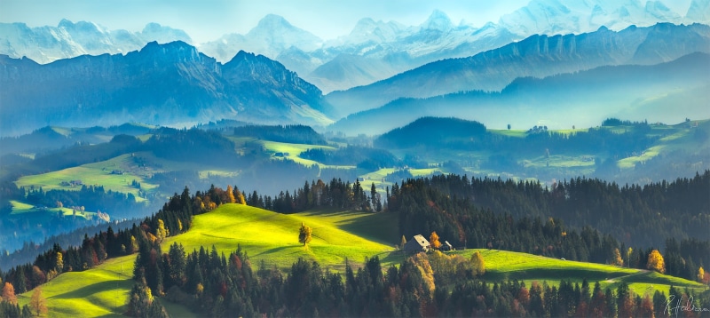 tranquil scene, outdoors, beauty in nature, mountain, idyllic, forest, cyan, trees, nature, no people, painting, rural scene, sky, green color, woodland