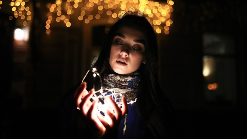 lifestyles, illuminated, focus on foreground, mouth, blue clothing, looking, indoors, night, one person, young adult, portrait, women, 1080P, mouth open