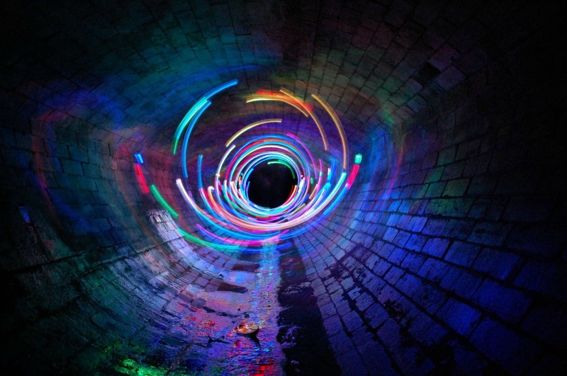 light at the end of the tunnel, circle, sewers, spiral, diminishing perspective, light painting, the way forward, green, no people, digital art, geometric shape
