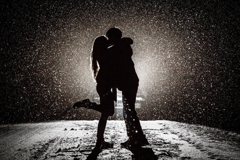 wet, lifestyles, kissing, silhoutte, outdoors, leisure Activity, vehicle, enjoyment, cold temperature, lights, back Lit, recreational Pursuit, sport, black Color