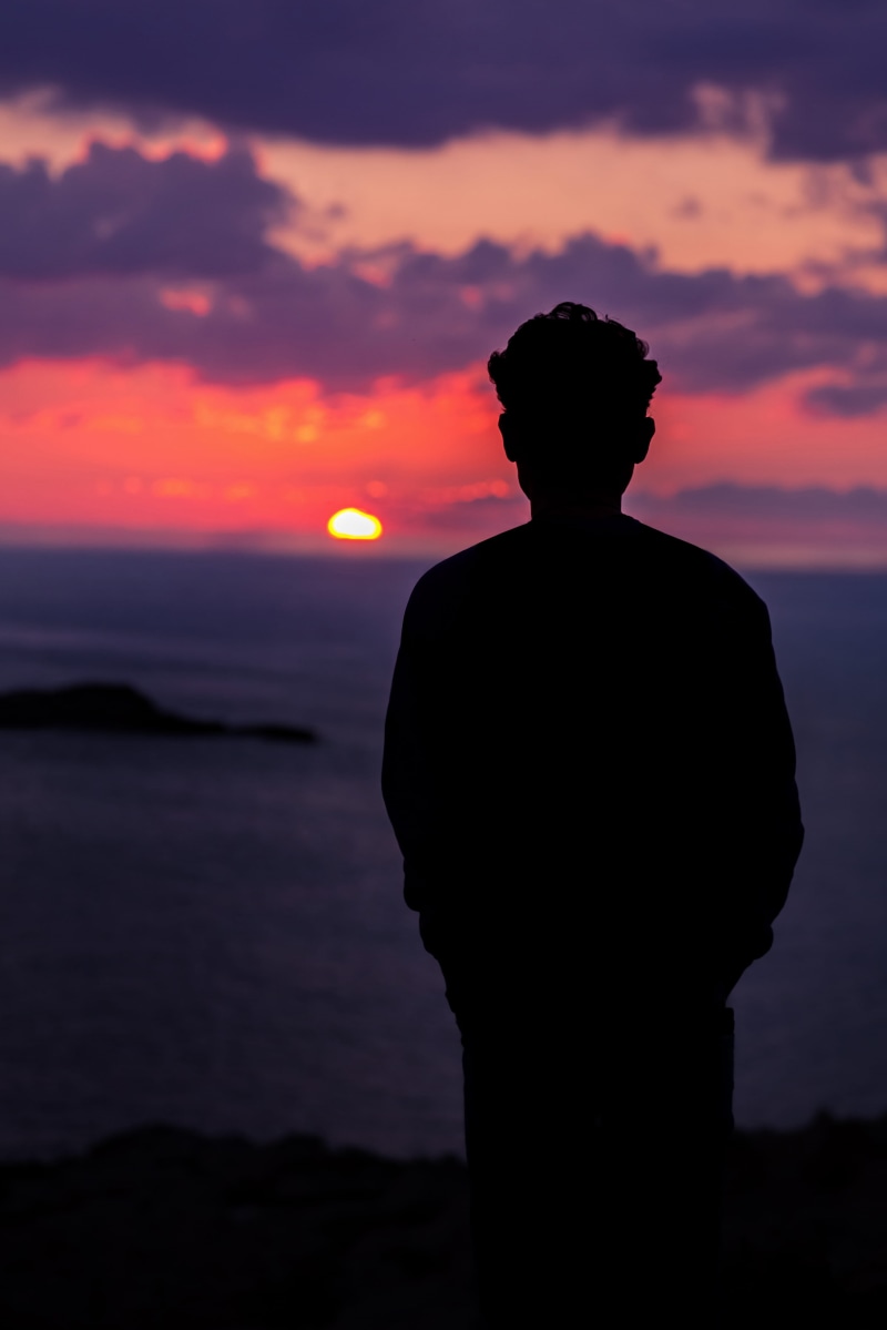 rear view, dom, loneliness, silhouette, water, golden hour, outdoors, malta, orange color, sunset, cloud - sky, beauty in nature, violet sky, men, concept