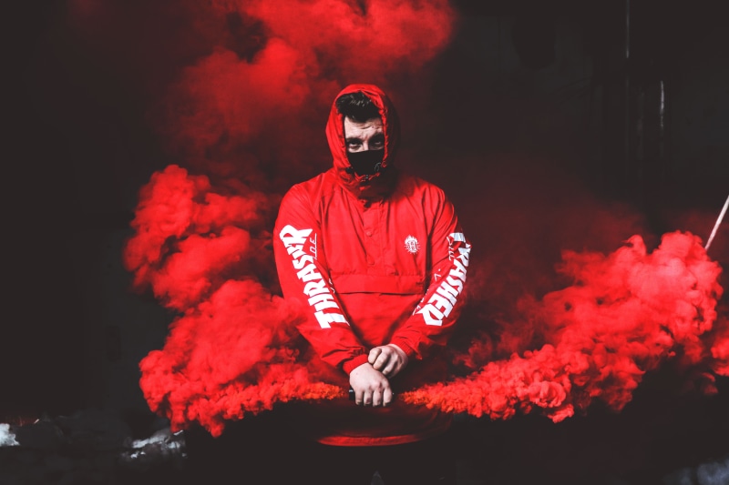 man, one person, thrasher, male, dark, young adult, american football - sport, 5K, holding, red jacket, ominous, red, canon, clothing, white, helmet, surrounded