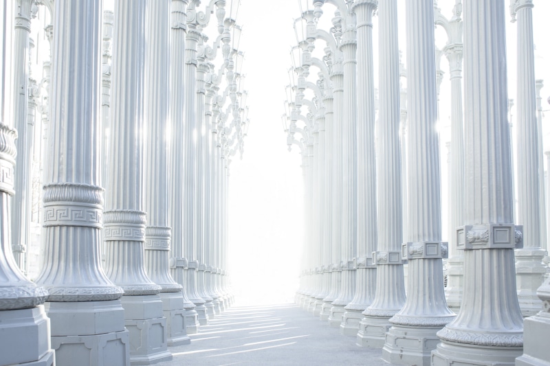 curtain, columns, diminishing perspective, sunlight, white, concrete, architecture, large group of objects, industry, colonnade, day, window, classical Greek