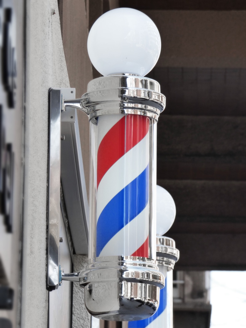 barber shop, turned, silver colored, focus on foreground, architecture, signal, technology, light, day, barbershop, built structure, communication, metal