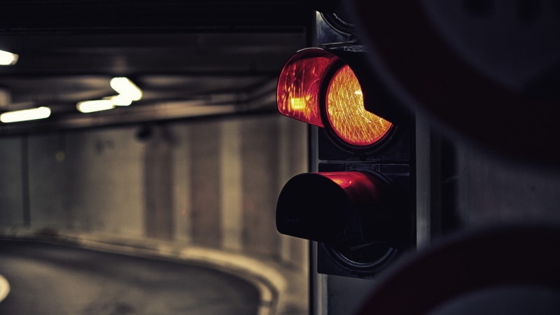 no people, road signal, outdoors, road, sign, red, road sign, transportation, safety, warning sign, stoplight, signal, illuminated, red light, guidance