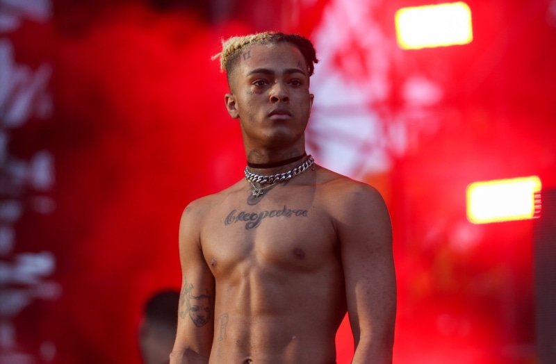 athlete, looking at camera, portrait, sport, young men, Singers, indoors, muscular build, one person, strength, red, adult, focus on foreground, 1080P