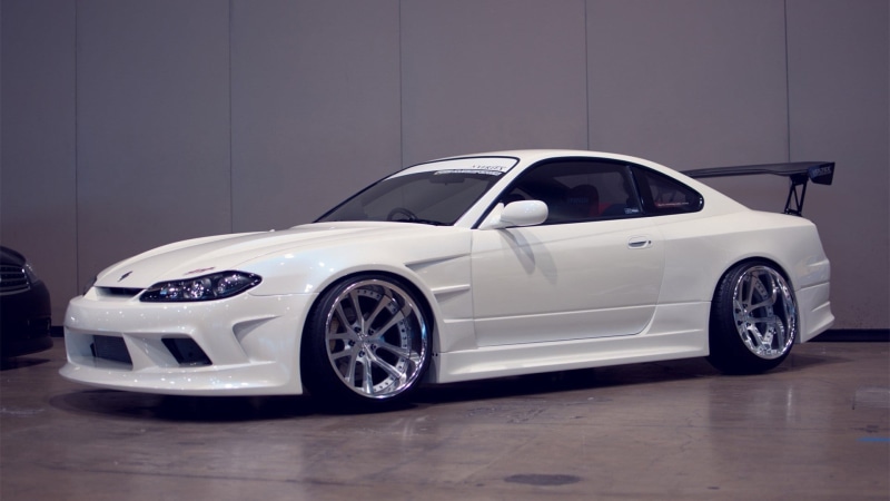 status Car, elegance, motor Vehicle, sports Car, retro styled, metal, s15, white, no People, reflection, shiny, land Vehicle, wealth, silver colored, parking