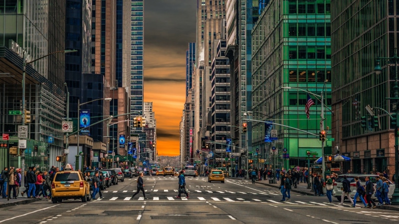 street, built structure, city life, machine, building exterior, city, office building exterior, york, new, real people, mode of transportation, large group of people