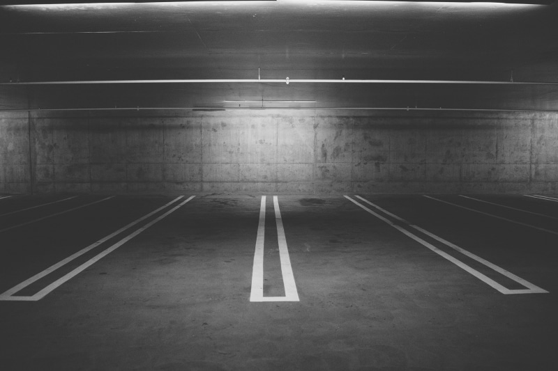 lot, guidance, marking, concrete, parking garage, public transportation, ceiling, road marking, grayscale, sign, parking, 2K, direction, illuminated, architecture