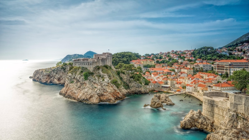 scenics - nature, day, shore, beauty in nature, croatia, building exterior, cliff, tree, sea, cape, 4K, peninsula, city, lovrijenac, no people, rock - object