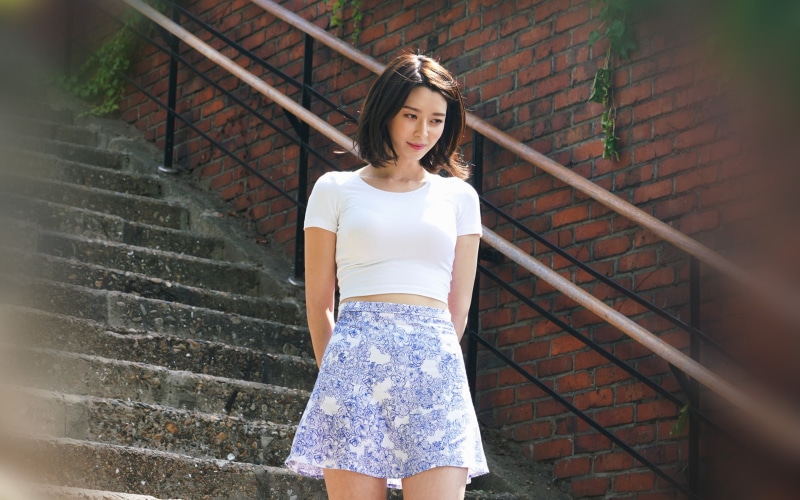 kwon, leisure activity, nara, brick, walking, beautiful woman, kpop, young women, hairstyle, outdoors, three quarter length, teenager, jean, shorts, standing